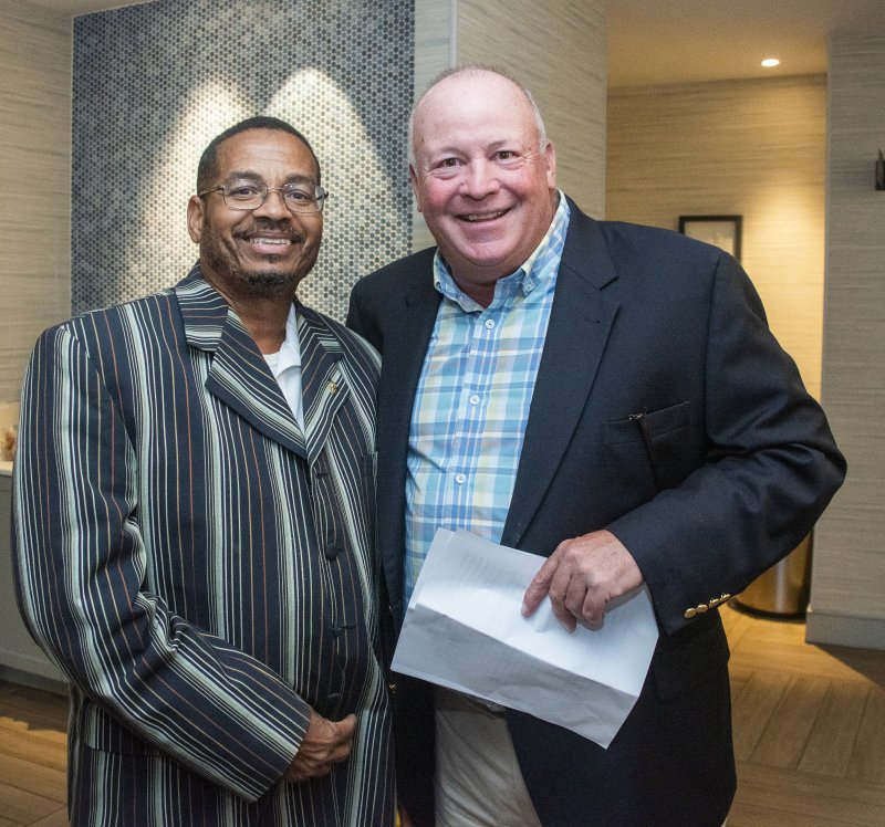 Auctioneers Efrem Phillips, left, and John Kelleher kept the bidding brisk and the atmosphere lively.